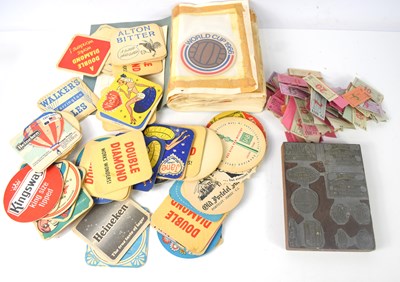 Lot 108 - A group of vintage beer mats, 1960s and later,...