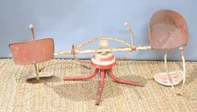 Lot 80 - A vintage Mobo Merry-Go-Round, in yellow and red.