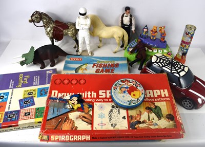 Lot 38 - A group of vintage toys and board games to...