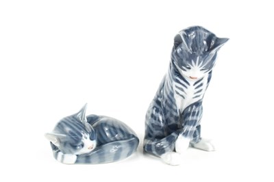 Lot 151 - Two Royal Copenhagen of Denmark pottery cats,...