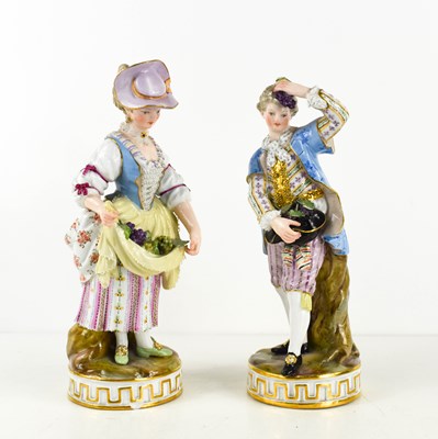 Lot 250 - A pair of Meissen figures of grape-pickers in...