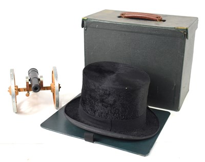 Lot 112 - A vintage silk top hat by Austin Reed, inner...