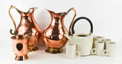 Lot 200 - A pair of Copper Arts & Crafts style jugs, a...