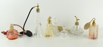 Lot 208 - A collection of perfume atomisers and perfume...