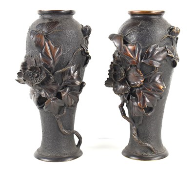 Lot 119 - A pair of Japanese bronze vases, with relief...