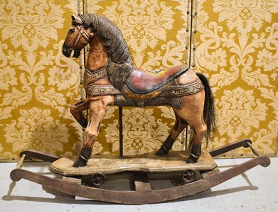 Lot 100 - A 20th century hand painted rocking horse,...