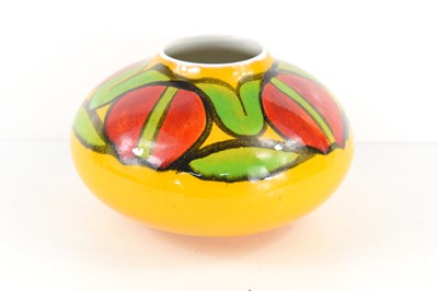 Lot 135 - A Poole pottery Delphis onion vase, yellow...