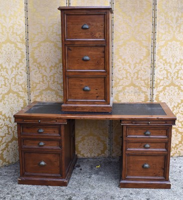 Lot 636 - A pine pedestal desk with inset black leather...