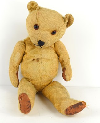 Lot 85 - A vintage teddy bear, circa 1938, having straw...