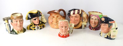 Lot 225 - A group of seven Royal Doulton character jugs,...