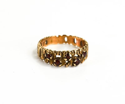 Lot 90 - A mid century modernist 9ct gold and garnet...