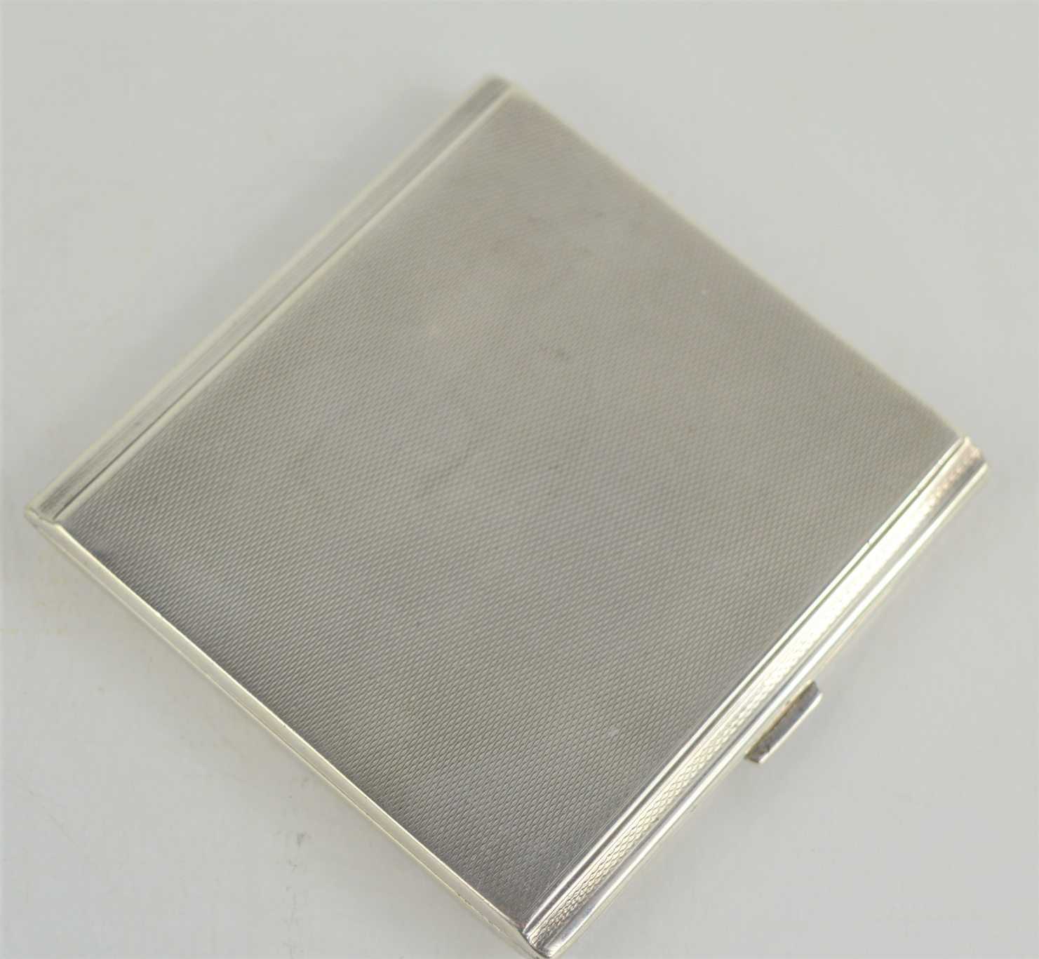 Lot 22 - A silver cigarette case, Birmingham 1932,...