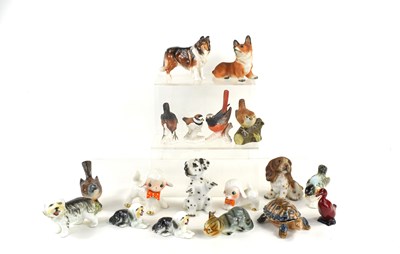 Lot 156 - A group of porcelain animal figures to include...