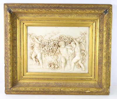 Lot 411 - A resin wall plaque in high relief depicting...