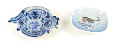 Lot 281 - A delft blue and white pin dish together with...