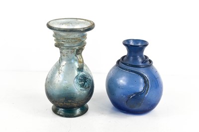 Lot 30 - Two antique glass vases, one in pale blue with...