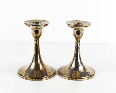 Lot 349 - A pair of silver candlesticks, trumpet form,...