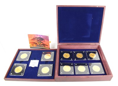 Lot 306 - A boxed set of 24ct gold coins, celebrating...