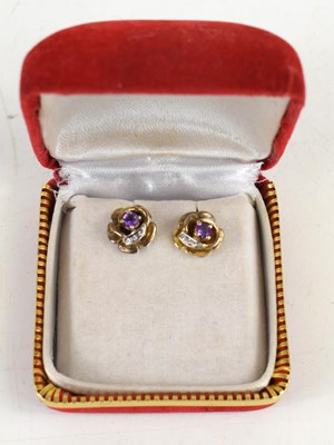 Lot 91 - A pair of amethyst and gold coloured earrings,...