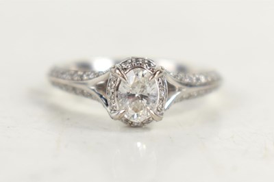 Lot 149 - An 18ct white gold, diamond oval solitaire...