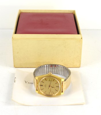 Lot 308 - A gold coloured Omega Geneve manual date...