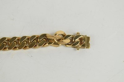 Lot 21 - A 9ct gold curb link bracelet, 50.8g.