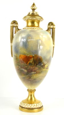 Lot 244 - A Royal Worcester vase and cover, the twin...