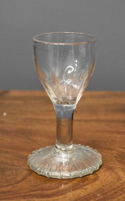 Lot 80 - An 18th century dram or firing glass, the...