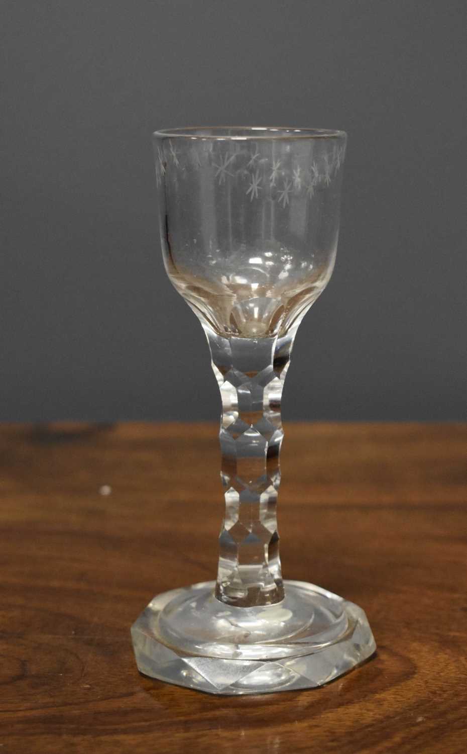 Lot 89 - Two Georgian wine glasses, one of conical form...