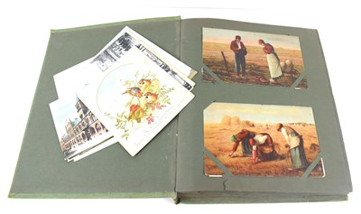 Lot 350 - An album of early 20th century postcards,...