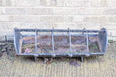 Lot 201 - An iron pig trough, painted black, 79cm long...