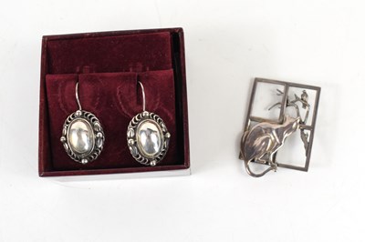 Lot 383 - A pair of Georg Jensen silver earrings, having...