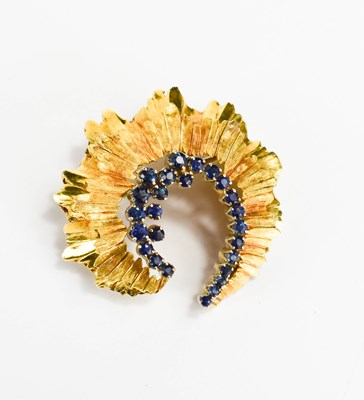 Lot 40 - An 18ct gold and sapphire brooch of modernist...