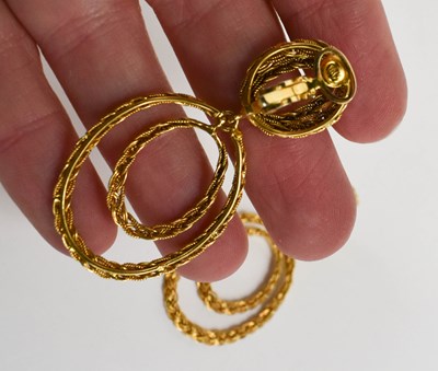 Lot 42 - A pair of 18ct gold double loop drop earrings...
