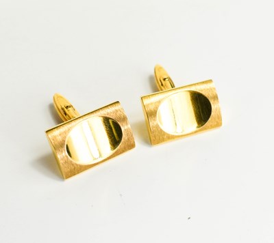 Lot 50 - A pair of 9ct gold cufflinks, of rectangular...