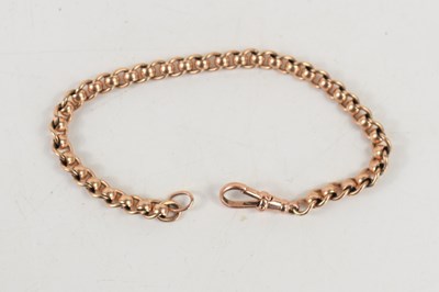 Lot 131 - A 9ct rose gold curb link bracelet with crab...