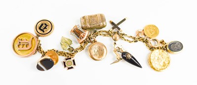 Lot 73 - A gold charm bracelet, with fifteen charms...