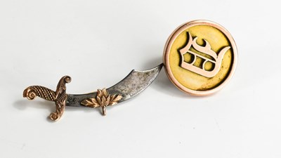 Lot 76 - A gold brooch in the form of an Indian sword,...