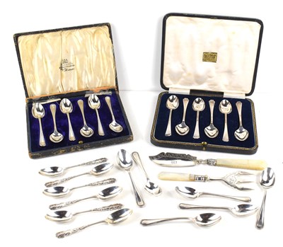 Lot 243 - A set of silver teaspoons, with bright-cut...