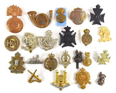 Lot 59 - A group of military cap badges to include...