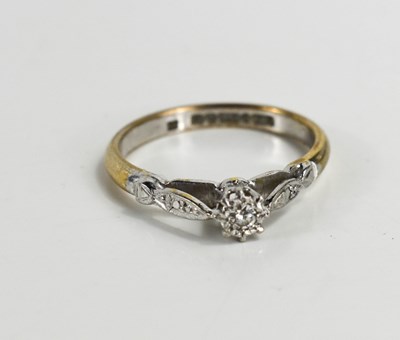 Lot 63 - A 9ct gold, platinum and diamond solitaire...