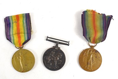 Lot 23 - Three WWI medals, two are named to Private E....