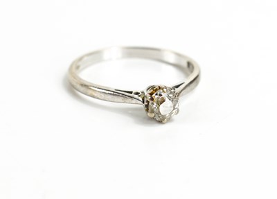 Lot 143 - An 18ct white gold and diamond solitaire ring,...