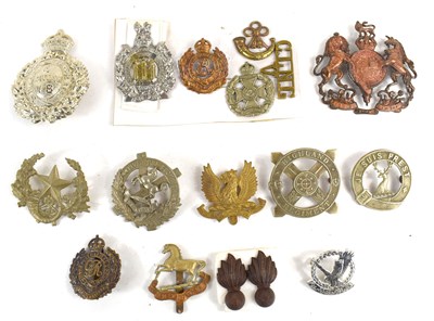 Lot 58 - A group of military cap badges to include...