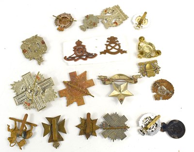 Lot 47 - A group of regimental cap badges to include...