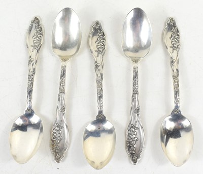 Lot 346 - A set of five silver teaspoons, the handles...