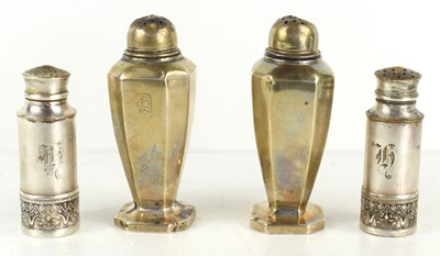 Lot 389 - Four silver pepper pots by Gorham Company, one...