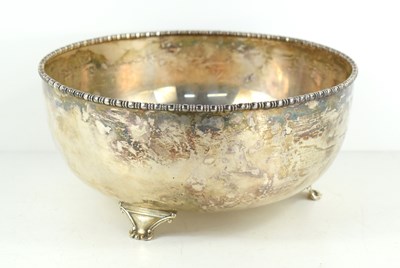 Lot 398 - A white metal fruit bowl with gadrooned rim,...