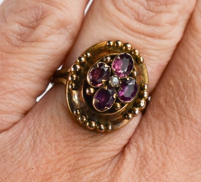 Lot 38 - A rose gold (unmarked) and amethyst oval...