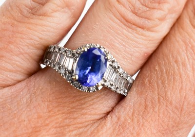 Lot 150 - An 18ct white gold ring set with tanzanite and...